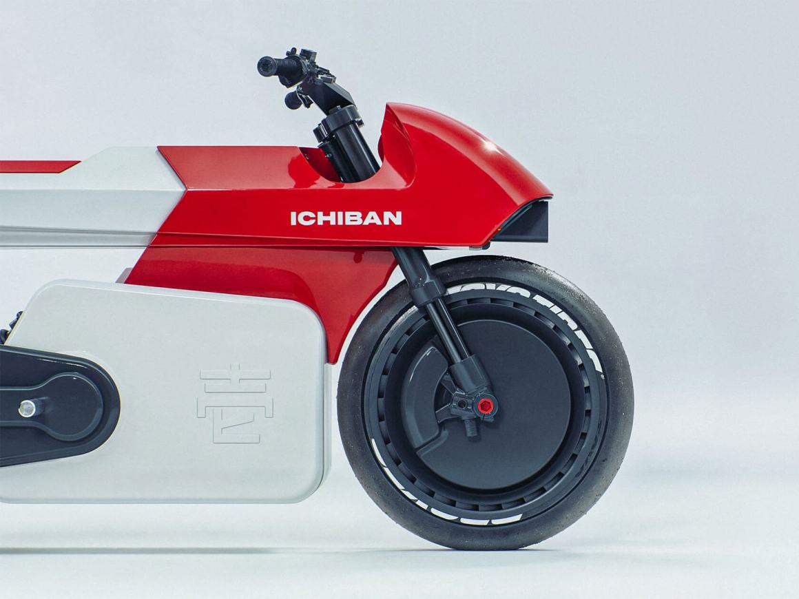 Side view of a modern electric motorcycle featuring a sleek white and red design with the brand name 'ICHIBAN' prominently displayed.